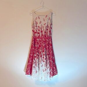Coral and white lacey  dress with belt.